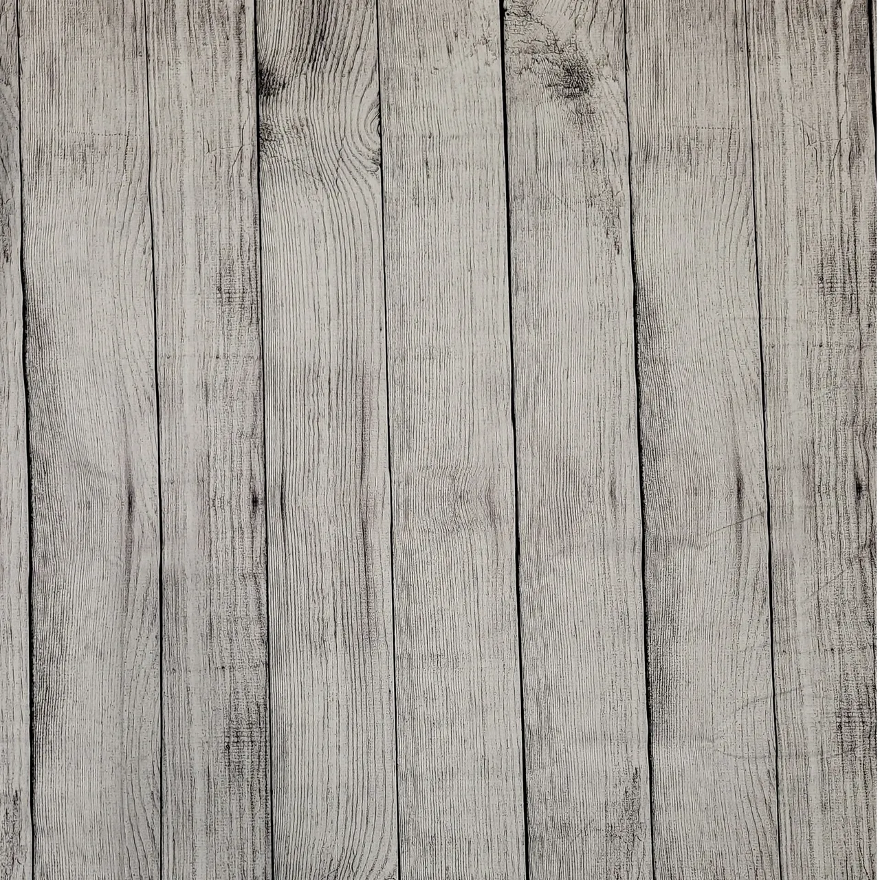 Rustic wood wall photo booth backdrop for barn weddings